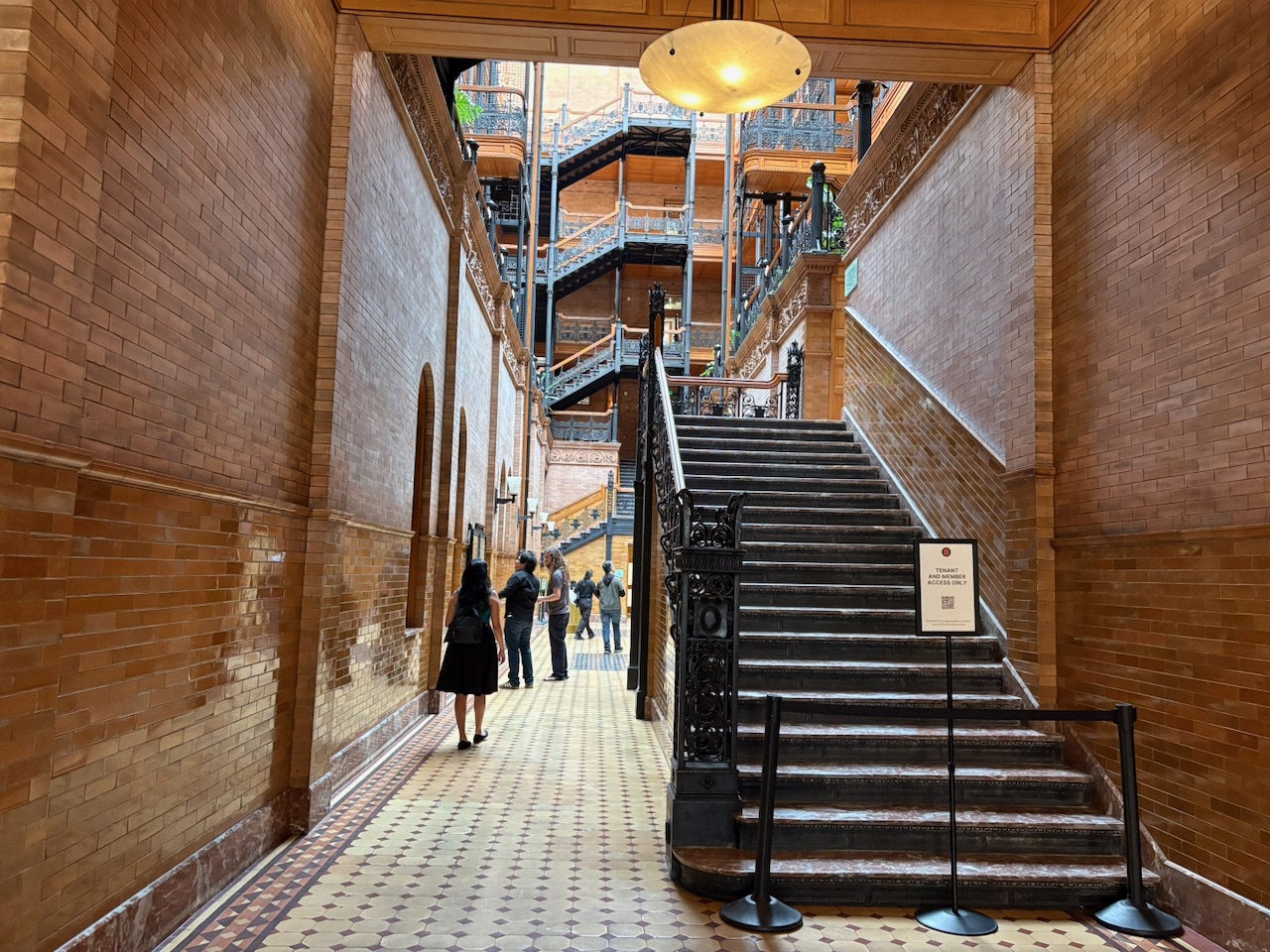 The Bradbury Building entrance hall with its grand staircase and ornate iron details